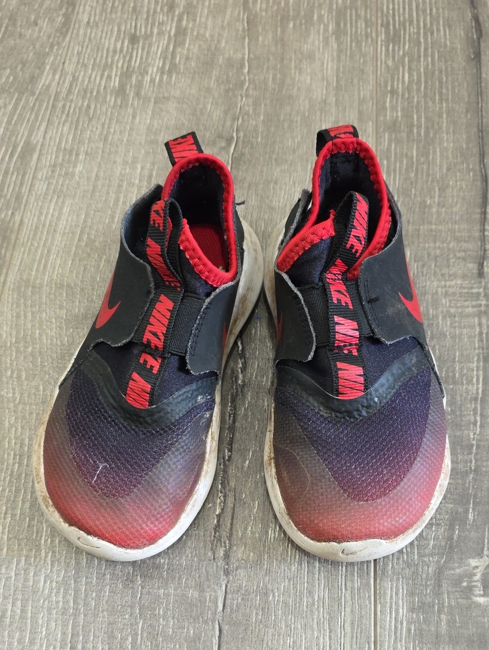 Nike Kids Red and Black Slip-On Sneakers